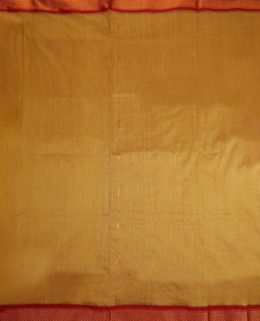 Mustard Yellow and Maroon Kalyani cotton saree featuring subtle woven motifs on the body, complemented by bold zig-zag patterned zari border and pallu, paired with a matching blouse.