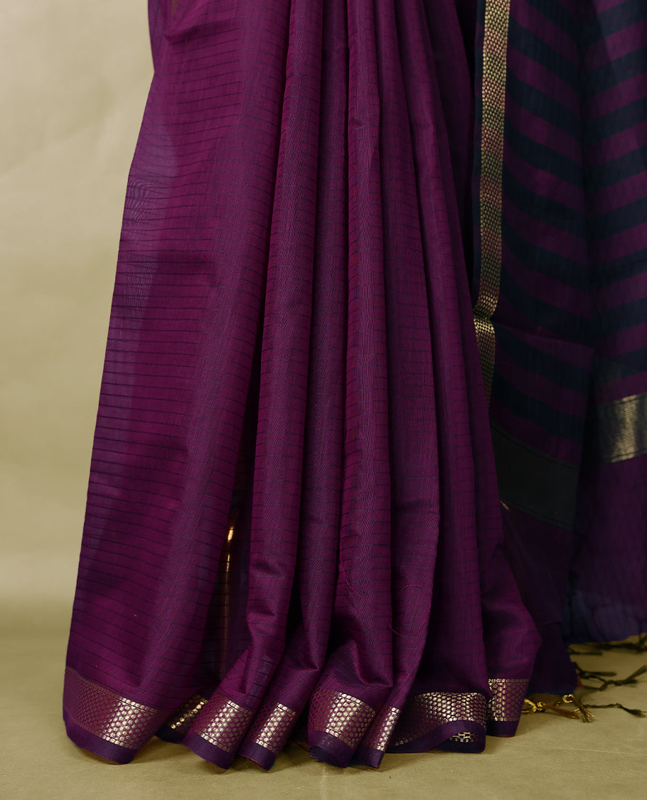 Deep Grape Purple colour chanderi cotton saree with fine striped body, mangalgiri border, grand pallu featuring Black and gold zari stripes, with matching blouse.