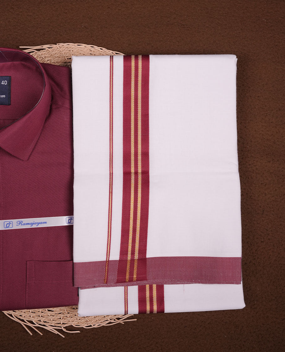 Maroon Colour shirt paired with a matching dhoti, finished with a maroon and gold border.