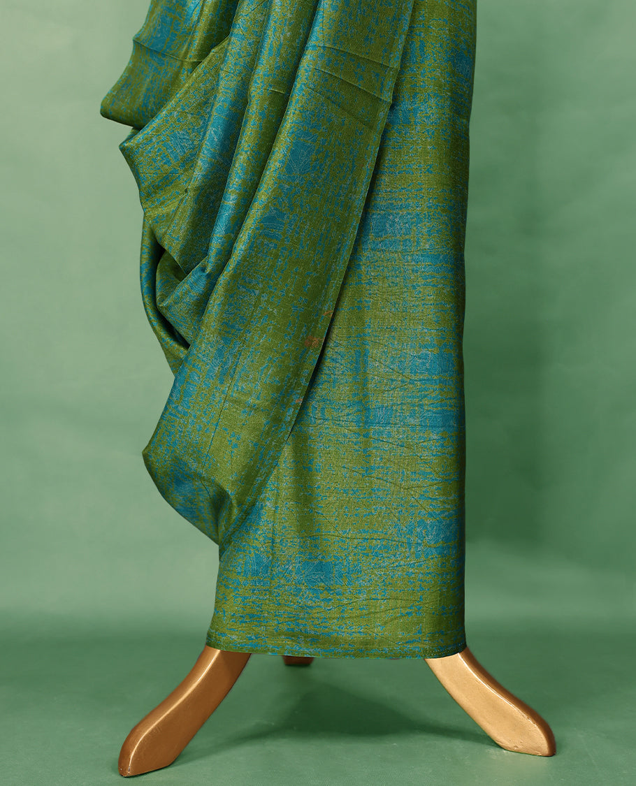 Olive green colour Manipuri saree with subtle blue textured patterns, minimal border, and comes with a matching blouse.