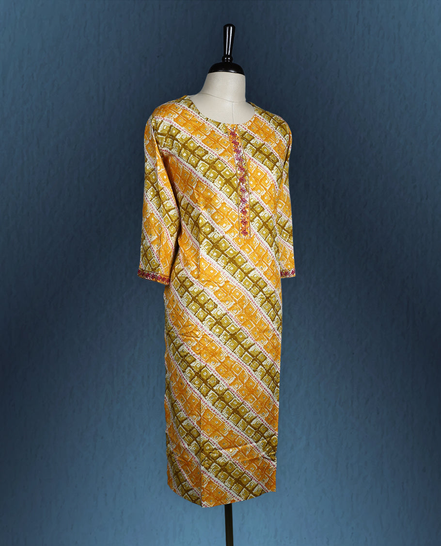 Multicolour kurti in shades of yellow, orange, and olive green, featuring an all over diagonal geometric print, accented with a round neckline and contrast embroidered placket, paired with three quarter sleeves
