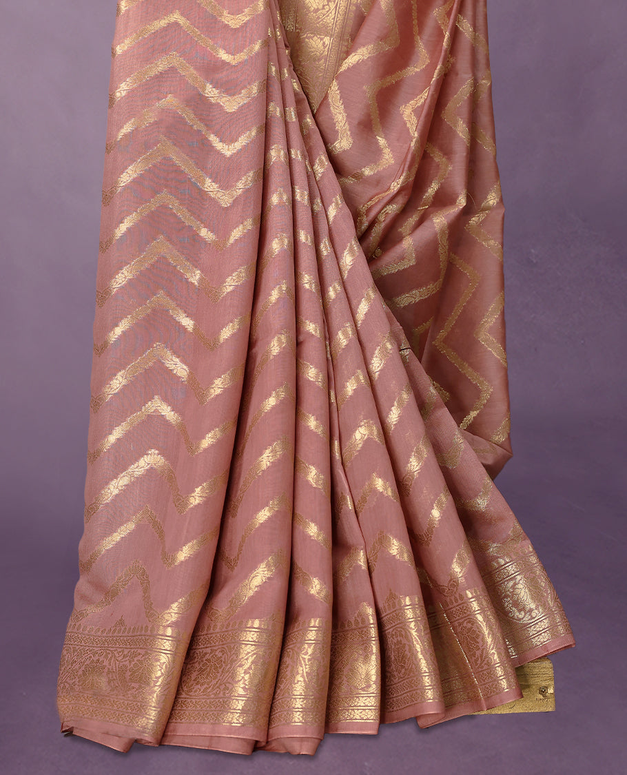Onion Pink colour pure Banarasi Chanderi cotton, beautifully adorned with traditional antique zig zag Kodi designs across the body, completed with a hand-dyed colour, a traditional border, and a matching blouse.