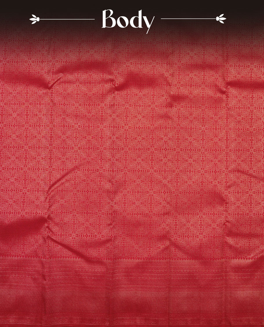 Maroon colour Kanchipuram pattern Manthrakodi saree adorned with antique zari jacquard work featuring elegant geometrical patterns across the body, complemented by a matching jacquard blouse piece for a regal finish.