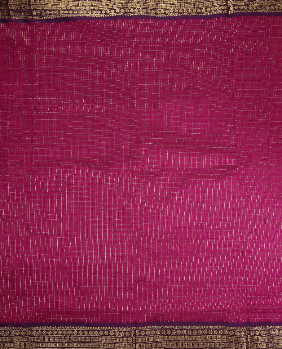 Magenta colour Kalyani cotton saree featuring silver zari checkered weave throughout the body, paired with a rich Purple colour traditional zari woven border and pallu, with matching blouse.
