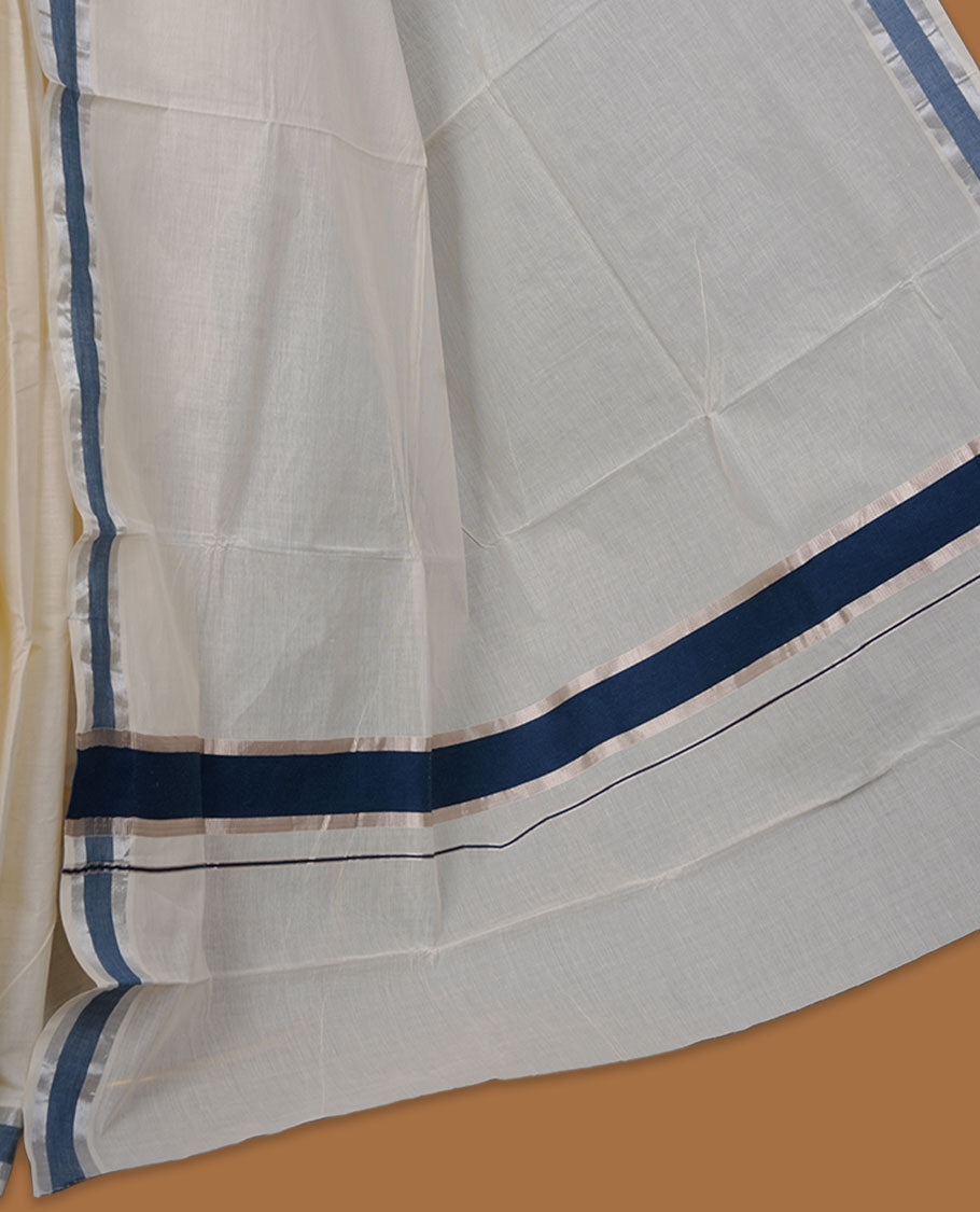 Off-white colour cotton Kerala saree highlighted with teal blue kasavu border, featuring a clean, minimalist body and a graceful flowing pallu, paired with a matching blouse.