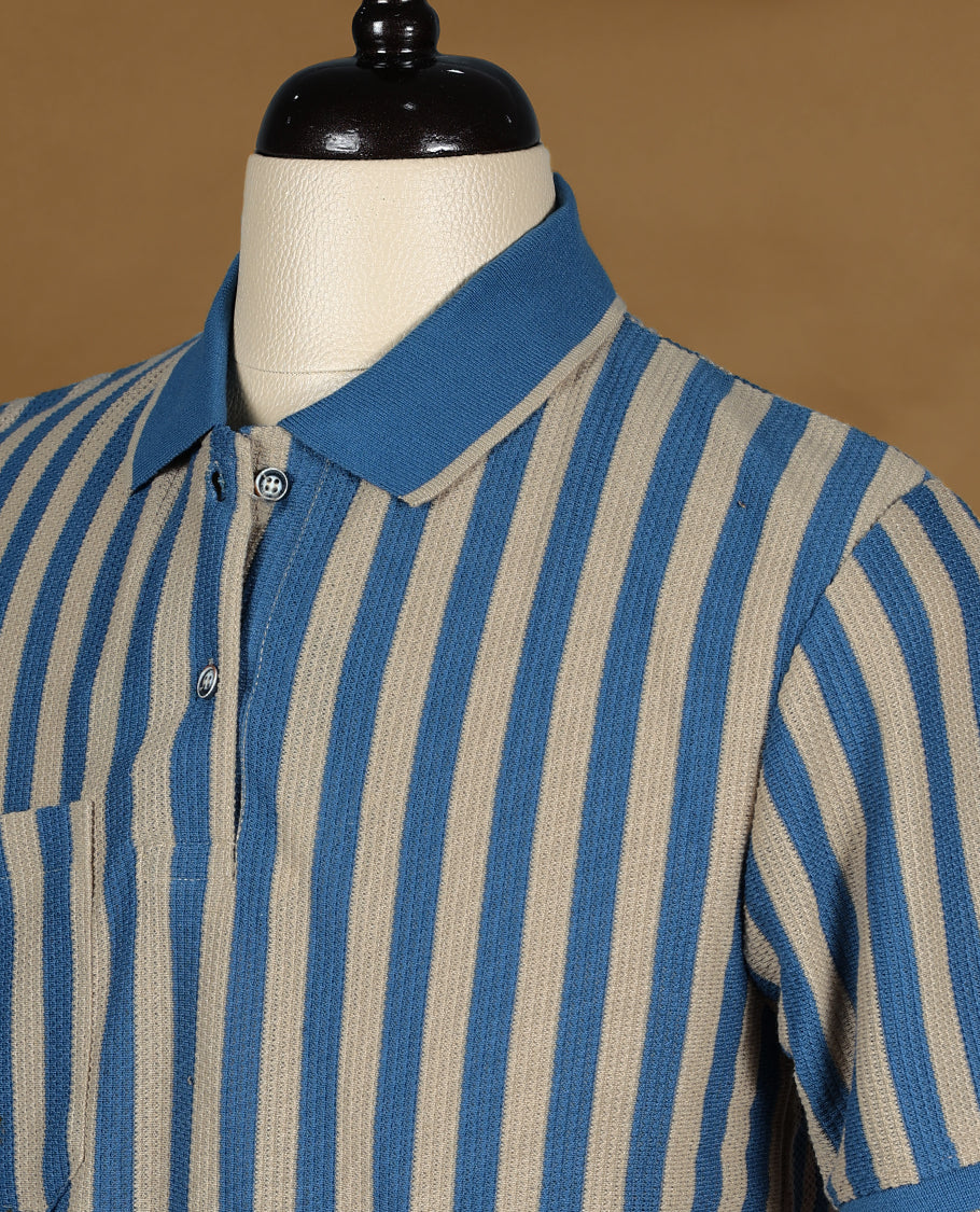 Blue and beige striped men's polo T shirt featuring a classic collar, half sleeves, button placket, and chest pocket crafted from breathable fabric for a timeless, casual, and comfortable look.