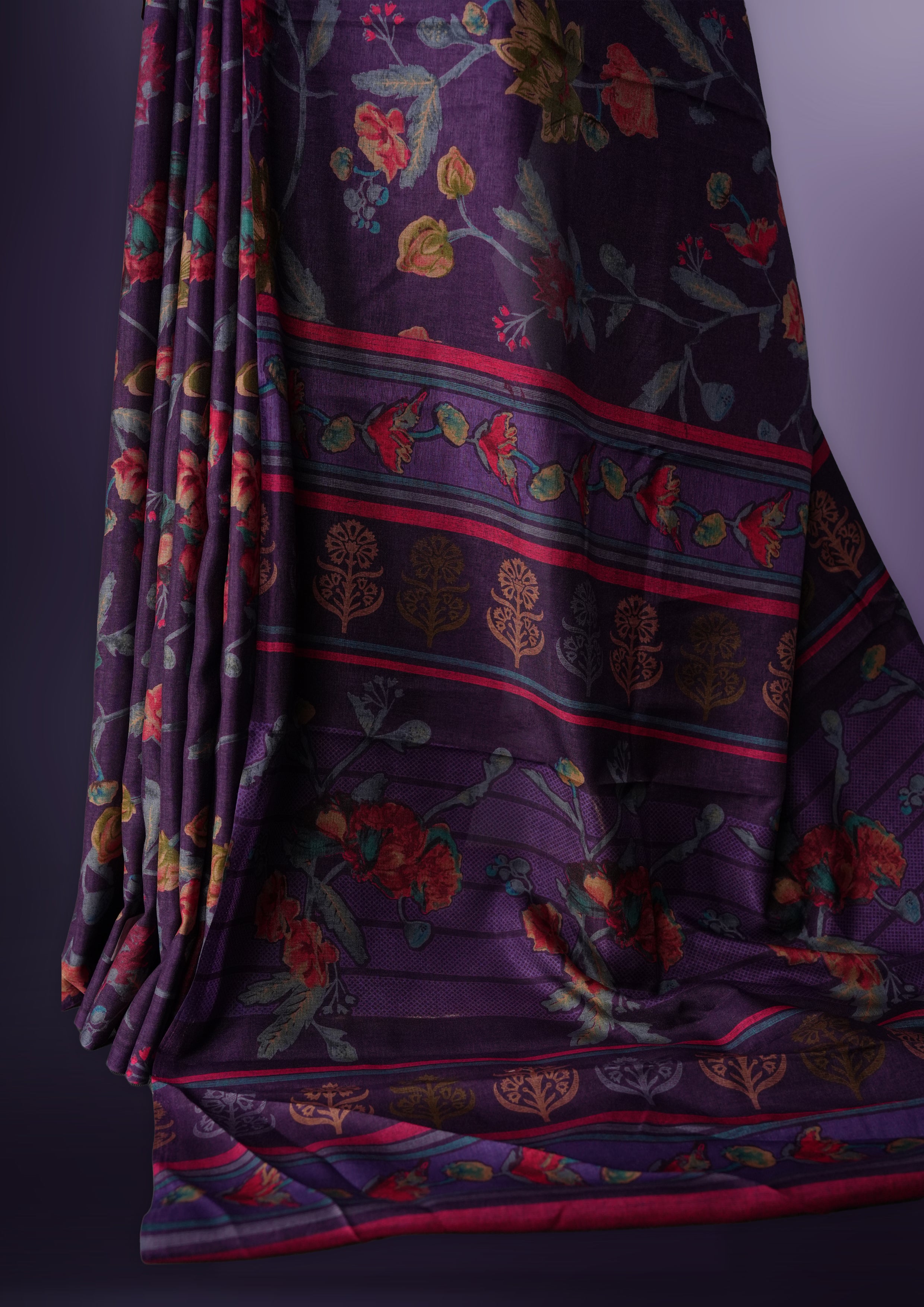 Purple colour saree enhanced with a vibrant multiple colour floral prints on body & pallu, and comes with a matching blouse.
