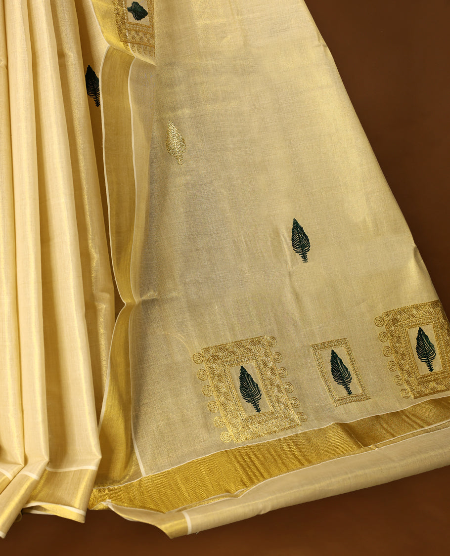 Light Gold colour Tissue Kerala saree featuring Embroidery work on body and a beautifully woven Gold Kasavu border, paired with a matching blouse perfect for festive occasions.