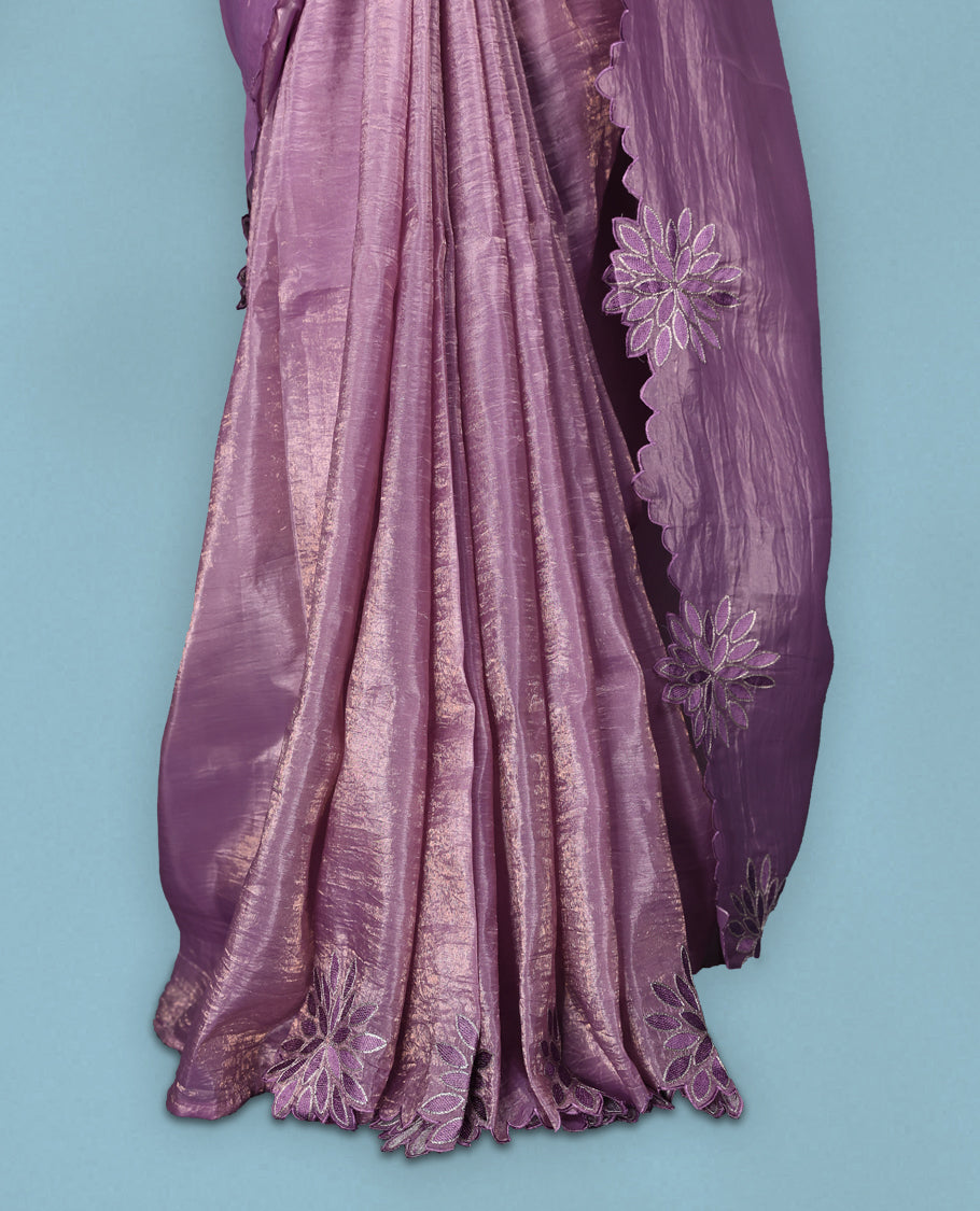 Pastel Purple colour crush soft silk saree adorned with bold floral thread embroidery on the body and scallop edged borders, Paired with a matching blouse for a complete look.