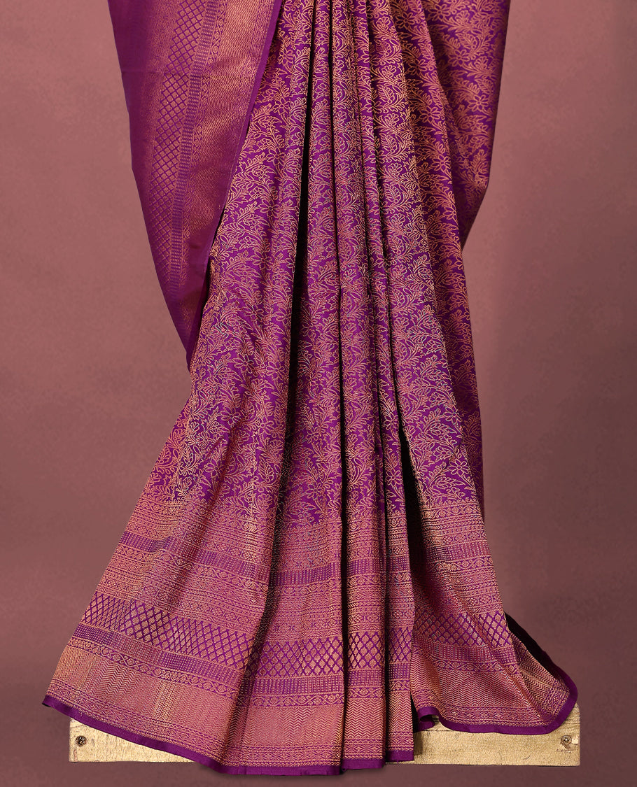 Vadamalli colour Kancheepuram saree featuring an antique zari brocade body, complemented by a traditional border and a matching blouse.