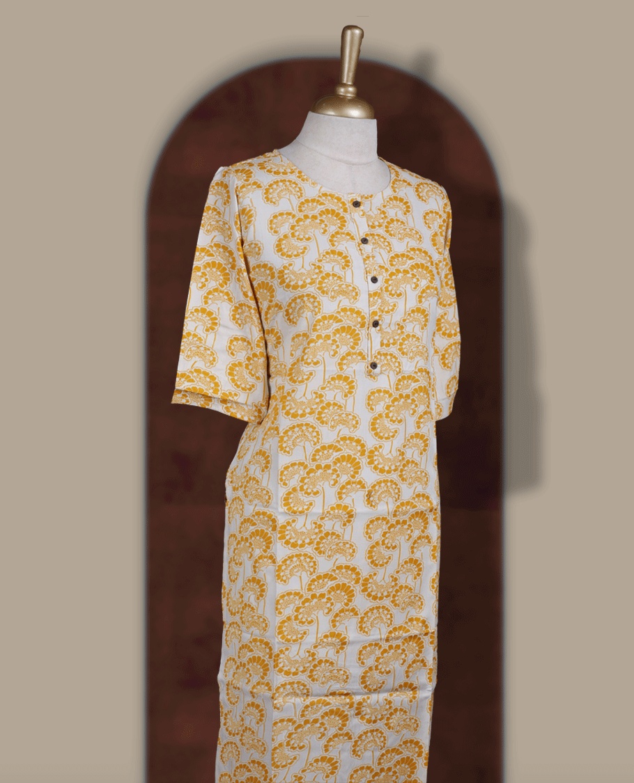 White colour kurthi from TWARA, with beautiful yellow floral prints & Designed with a round neckline, button placket, and 3/4 sleeves.
