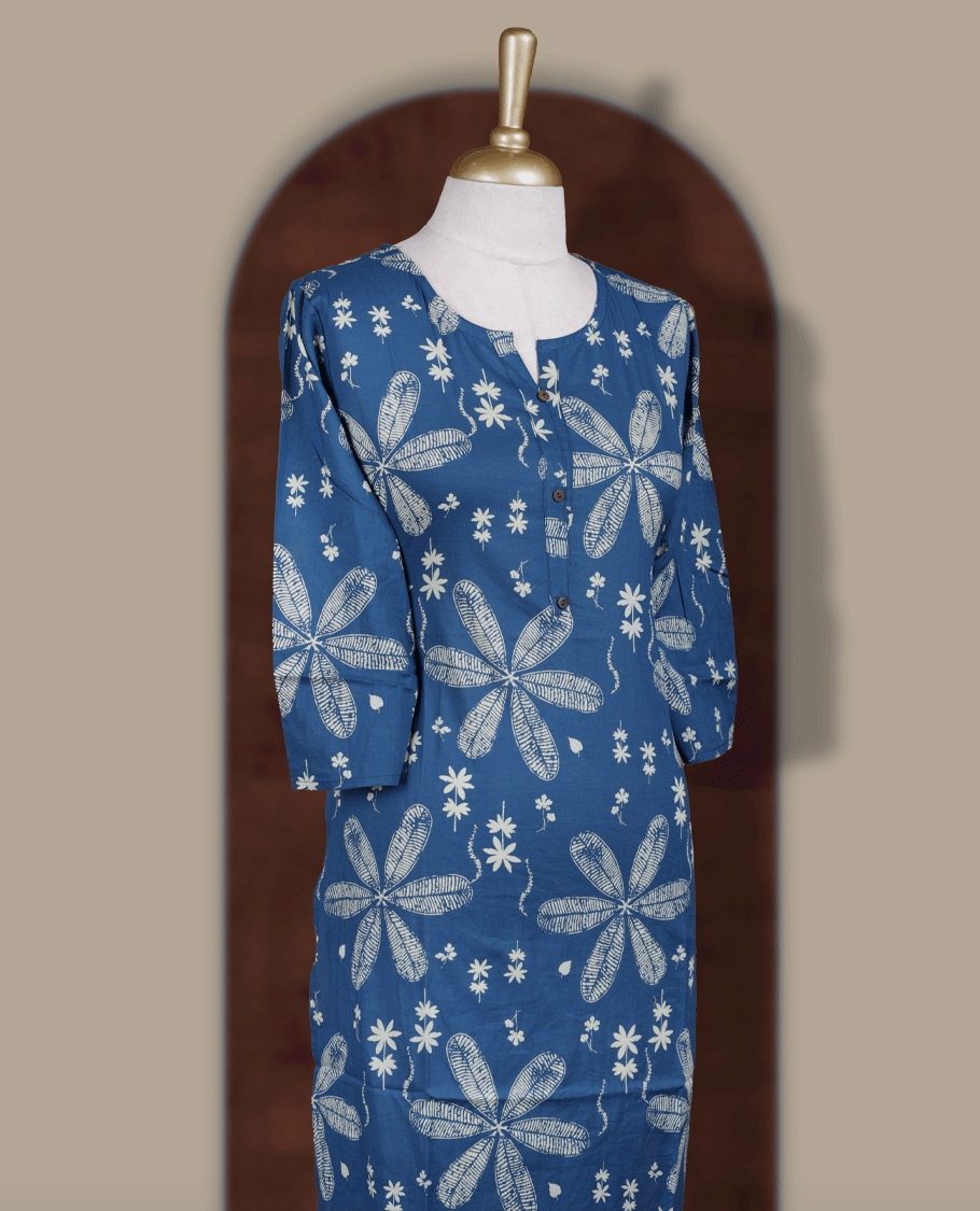 Blue colour kurthi featuring with off white floral prints all over & Designed with a round neckline with V notch, button placket, and 3/4 sleeves.