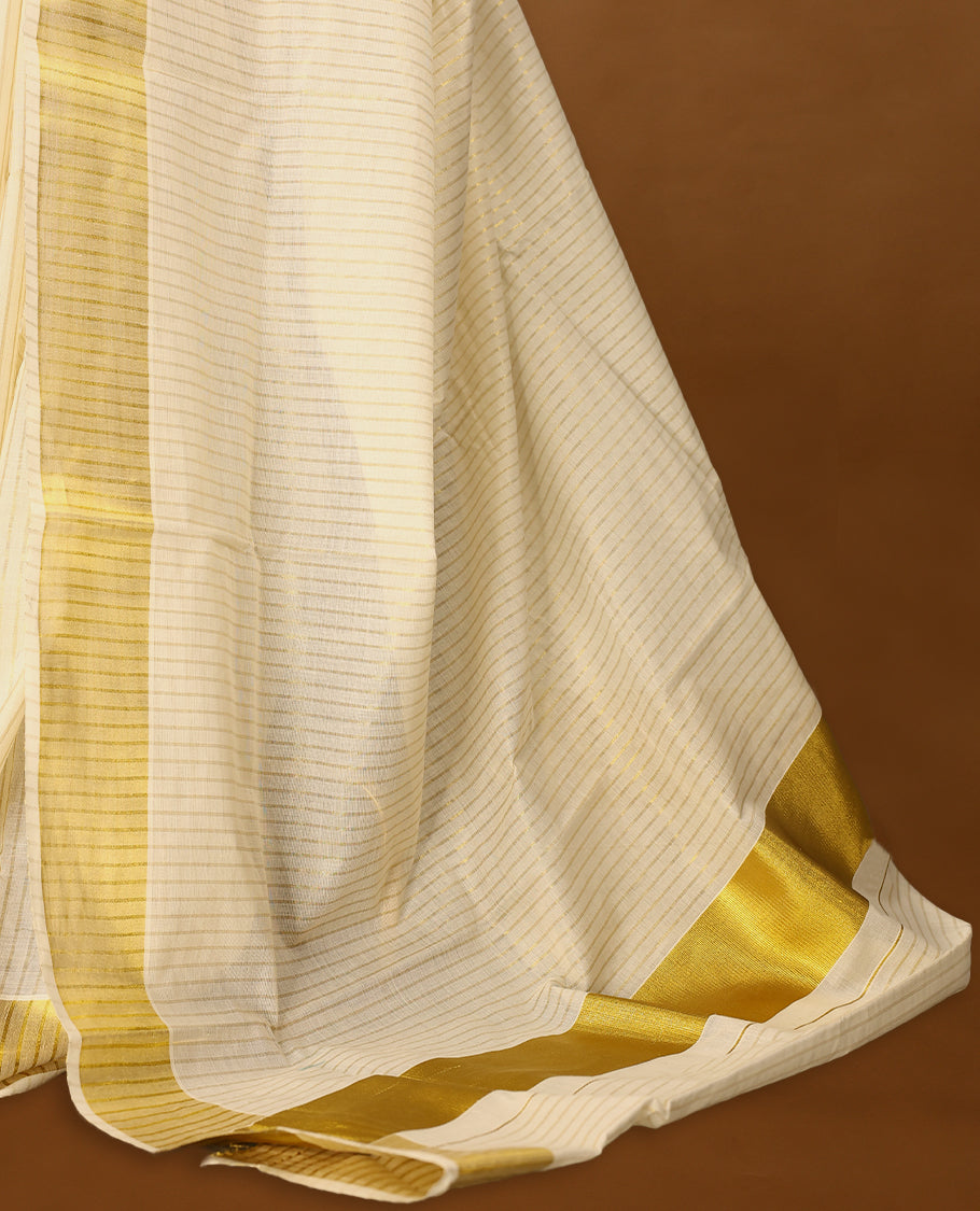 Kerala cotton saree with fine golden stripes and a lustrous zari border with Matching Blouse