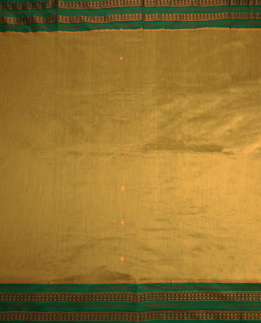 Warm olive and Green Kalyani cotton saree adorned with delicate woven buttas on the body, complemented by intricate zari woven border and pallu in green, paired with a matching blouse