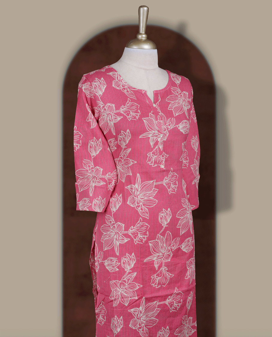 Soft pink colour kurthi adorned with delicate beige colour floral prints, featuring a stylish V notch round neckline and comfy 3/4th sleeves.