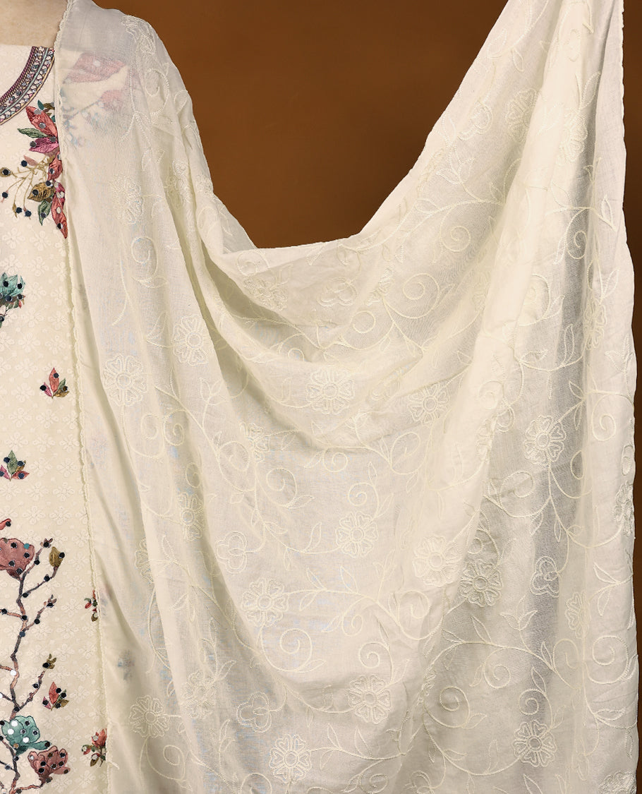 Off-white ensemble featuring a hand-embroidered top with intricate threadwork, paired with matching bottoms and a worked dupatta.