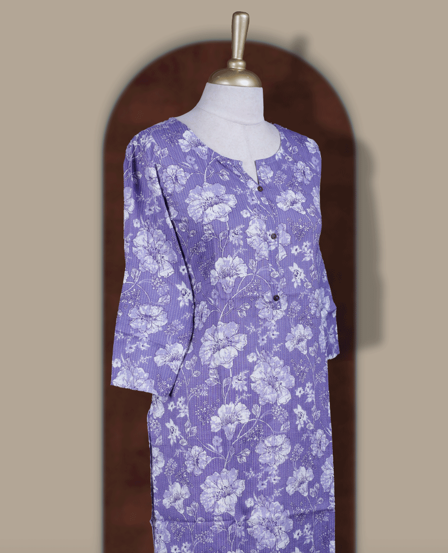 Pastel purple colour kurthi adorned with delicate white floral prints, featuring a stylish V notch round neckline and comfy 3/4th sleeves & Designed in a straight cut silhouette for a graceful, everyday look.