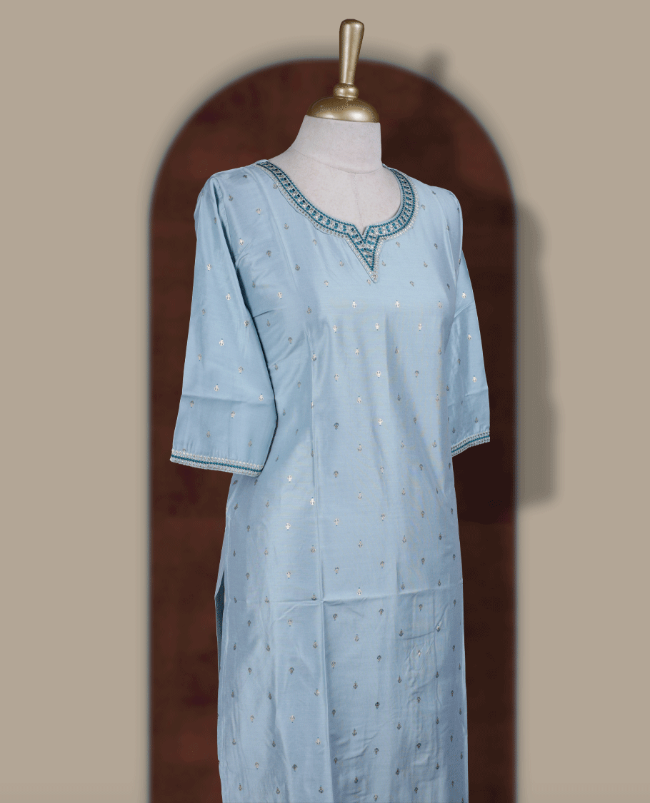 Pastel blue colour kurti from TWARA, adorned with delicate light golden & blue colour embroidery, featuring a stylish V notch neckline and comfy 3/4th sleeves.