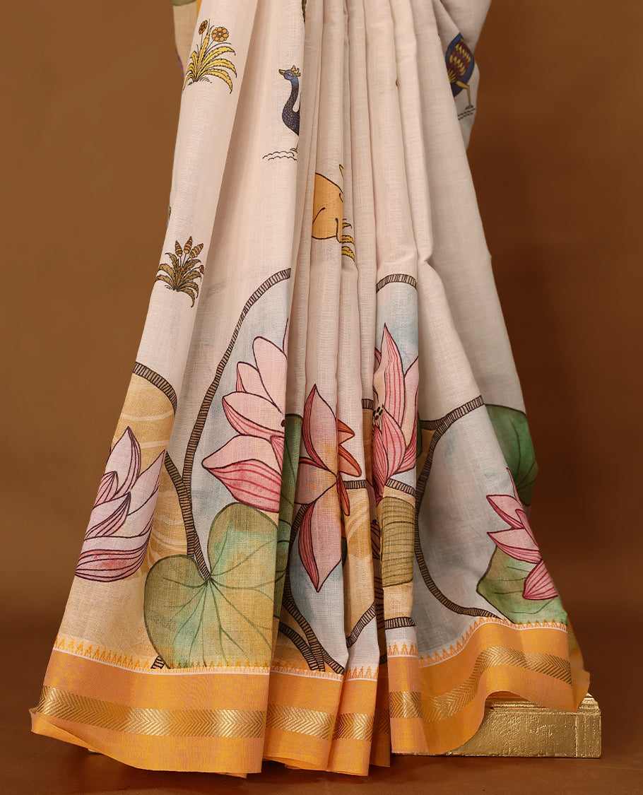 Off white and Orange Colour lightweight khadi cotton saree with earthy-coloured digital floral prints on the Body and pallu, paired with a matching blouse.