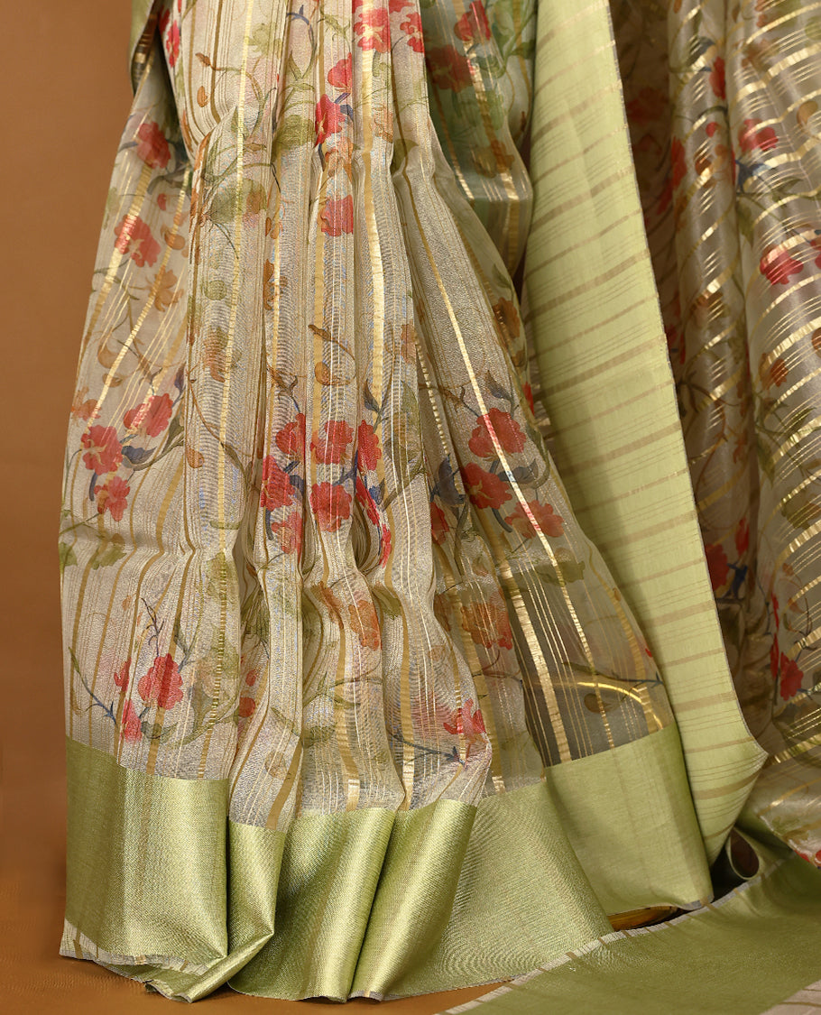 Pista semi-organza saree with intricate floral jaal work, elegant border, and a matching silk brocade blouse.