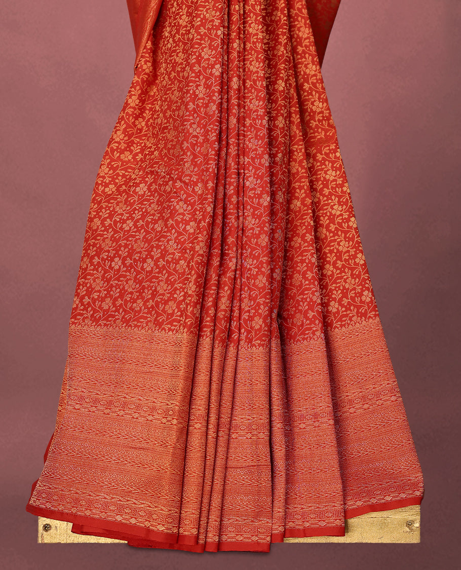 Red colour Kancheepuram saree featuring an antique zari brocade body, complemented by a traditional border and a matching blouse.