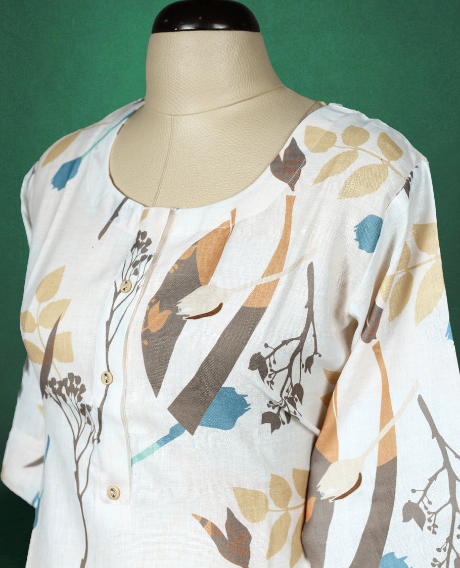 Off white cotton kurti with earthy toned abstract floral prints, round neckline, front buttons, and elbow-length sleeves, breezy and artistic choice for casual outings.
