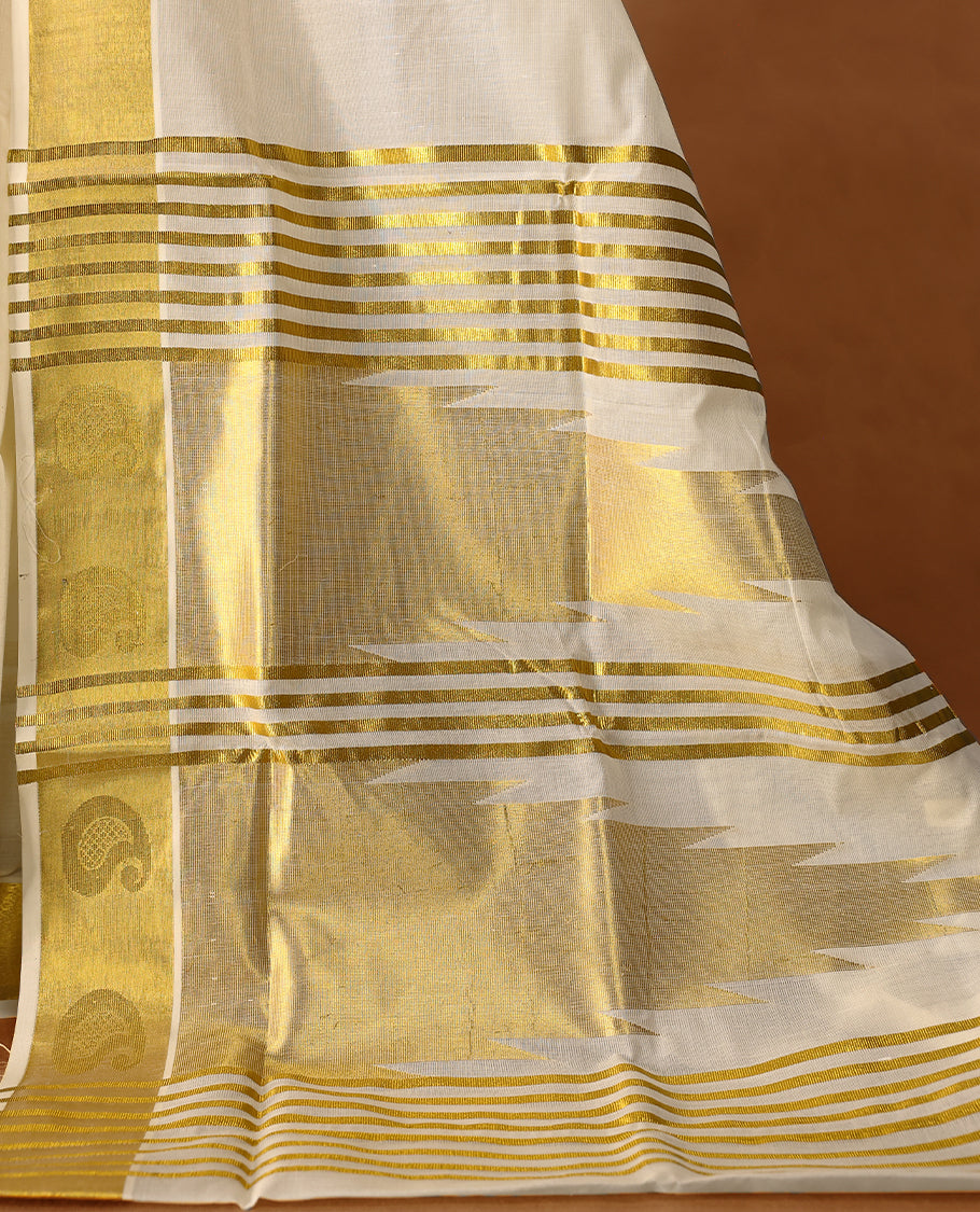 Elegant off white colour cotton Kerala saree featuring Plain body, Gold Kasavu border with Mango Motifs, rich pallu with temple motifs, Paired with matching blouse offering a classic and graceful look, paired with a matching blouse.