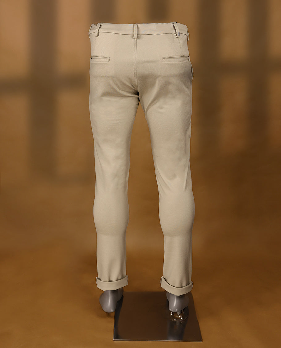 Cream colour IRONY plain formal pants for men.