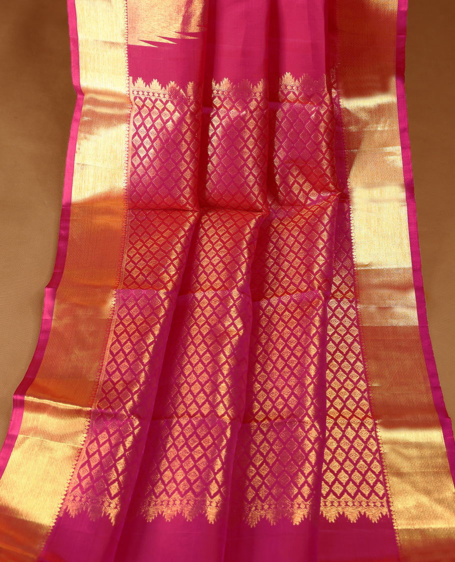 Pink traditional Kancheepuram silk saree featuring Plain body, a coordinated Traditional Temple design on the border, and a matching blouse.