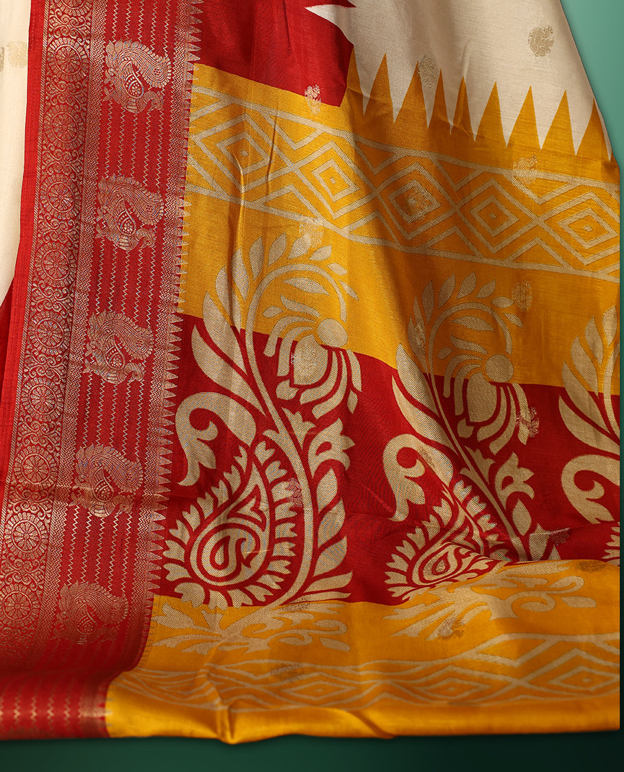 Cream and yellow colour saree featuring a rich red zari woven border and pallu, adorned with traditional floral motifs, and paired with a matching blouse