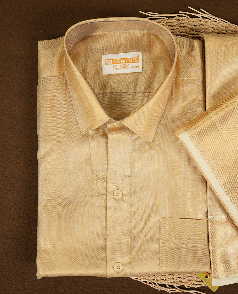 Biscuit colour Aswin’s wedding set featuring a refined silk shirt and matching dhoti with gold zari detailing, crafted for timeless elegance and perfect for traditional weddings and festive occasions.