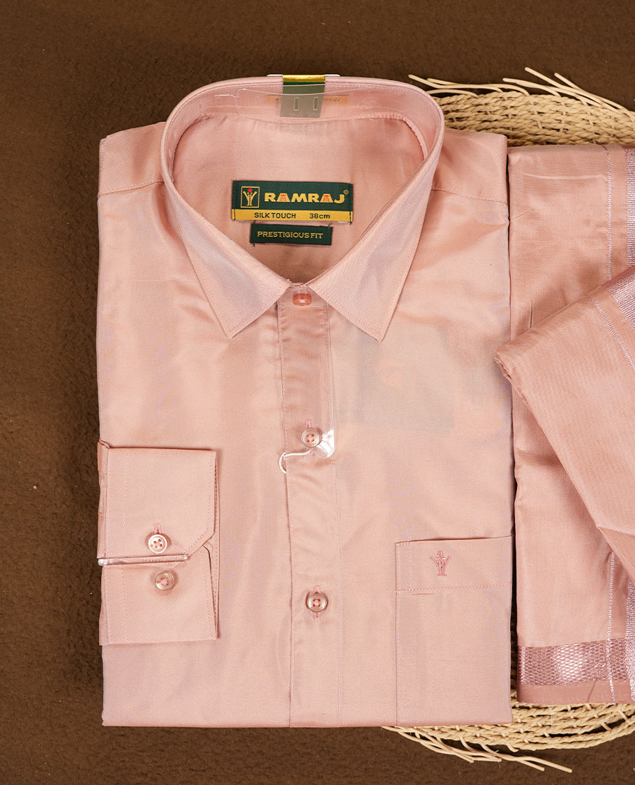 RAMRAJ Pink Colour kurtha paired with a pink dhoti and a pink towel, elegantly finished with a matching Rose Gold border.