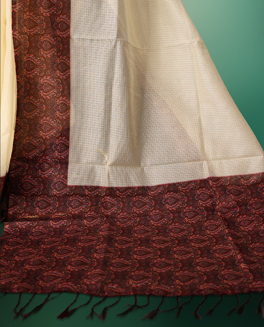 Off White colour kota net saree adorned with Plain body, enhanced by a deep maroon Printed border for bold contrast, and paired with a matching blouse