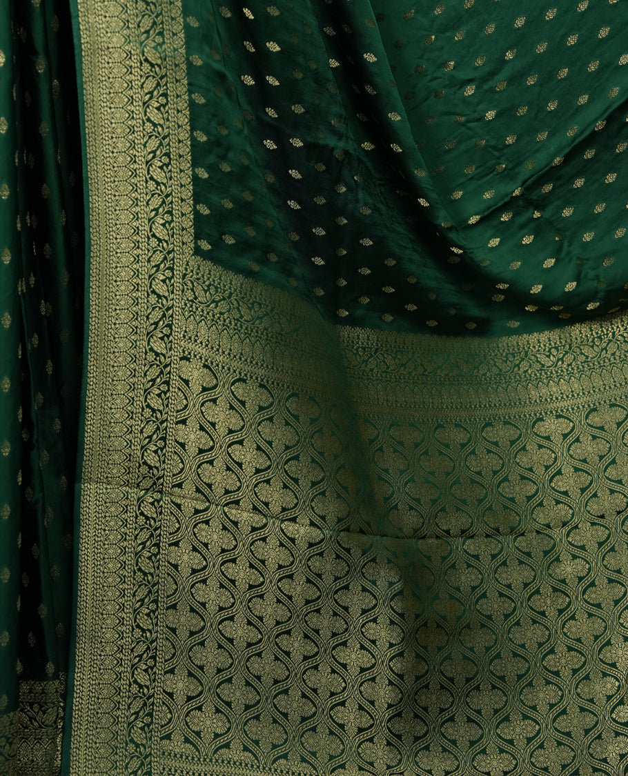 Green Colour semi Banaras satin crepe saree with Gold Zari Leaf Motifs, Traditional Dark Green Border, Elaborate Woven Pallu, Decorative Tassels with Matching Blouse