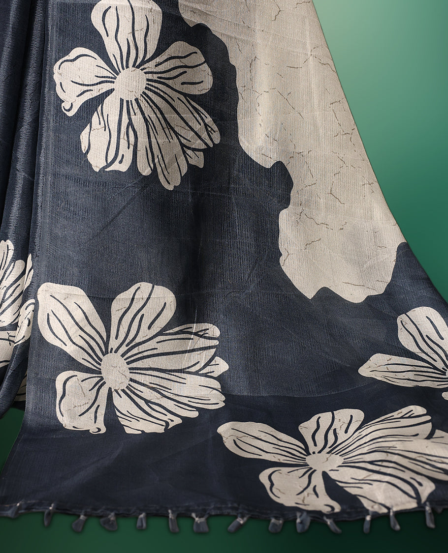 White and grey double shade semi tussar saree adorned with bold floral motifs across the body, designed without a border for a contemporary touch, and paired with a matching blouse