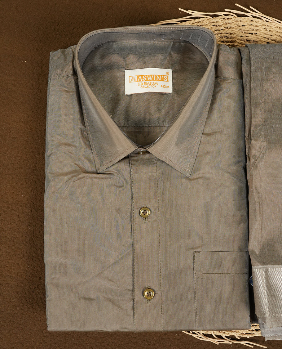 Chocolate colour Aswin’s wedding set featuring a refined silk shirt and matching dhoti with gold zari detailing, crafted for timeless elegance and perfect for traditional weddings and festive occasions.