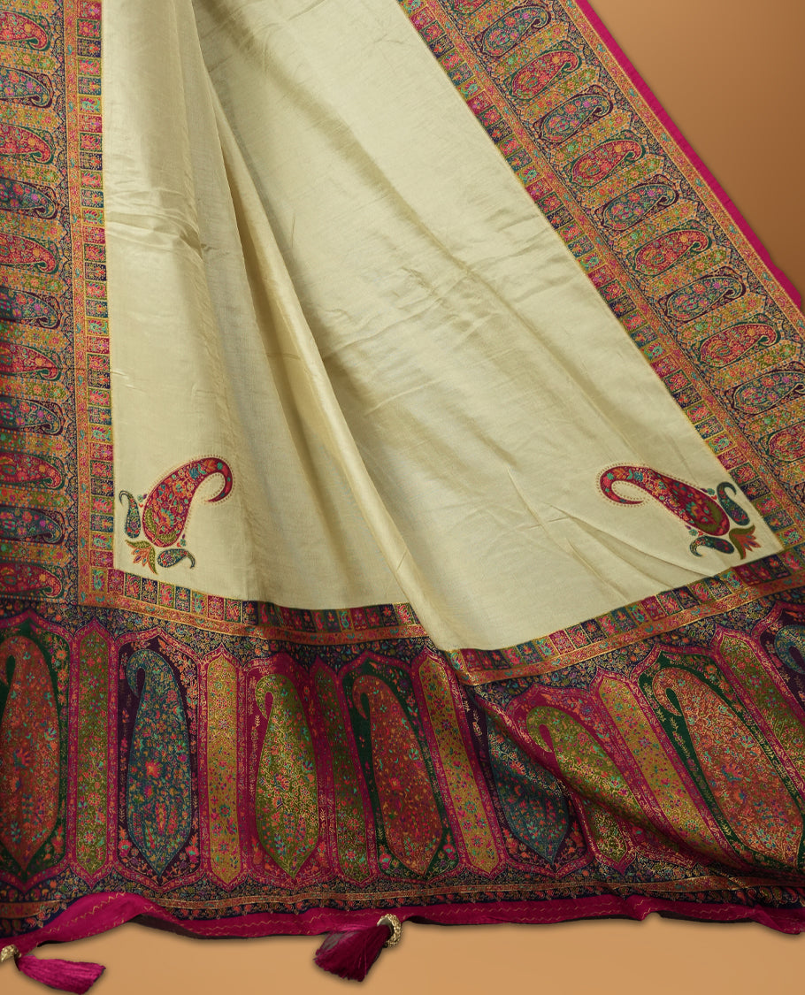 Cream Pashmina Silk Saree with Plain Body, Adorned with Intricately Woven Multicolor Paisley and Floral Motifs on Vibrant Pink-Gold Zari Border & Grand Pallu, Paired with Matching Blouse Piece