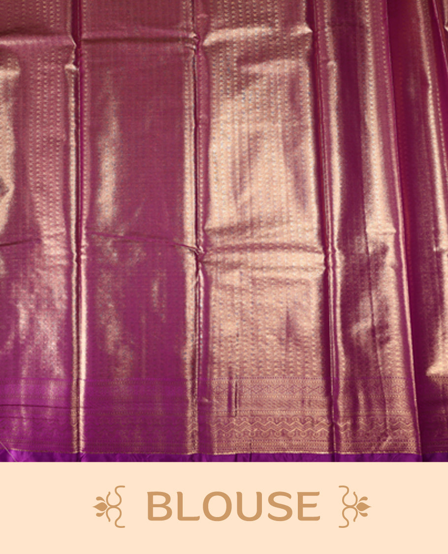 Golden semi silk brocade saree with intricate self brocade work across the body, paired with a rich contrast violet border and matching pallu. Includes a coordinating blouse for an elegant traditional look.
