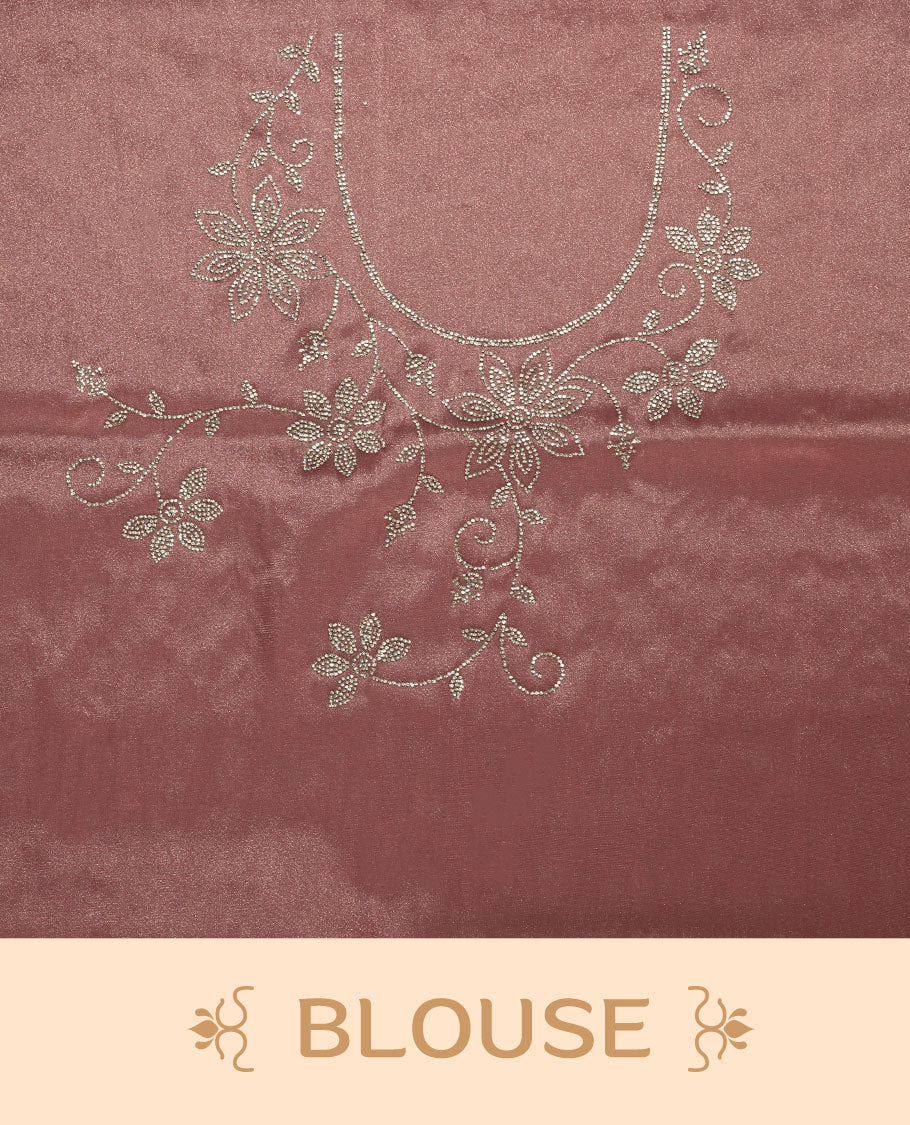 Pastel Pink Colour net shimmer fancy saree adorned with scattered white stone buttas all over the body, paired with a delicate stone worked border and matching blouse featuring floral vine stone embroidery