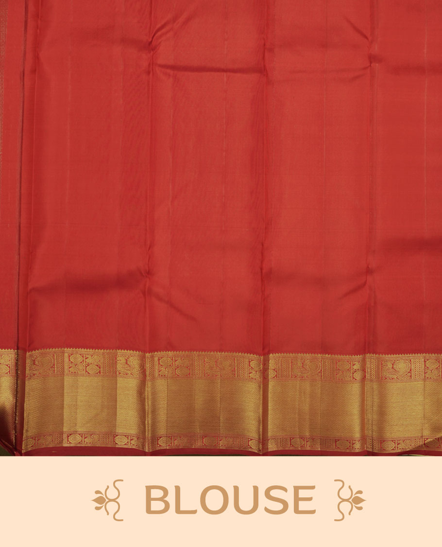 Maroon colour Kanchipuram pattern Manthrakodi saree featuring traditional golden zari cross kodi jacquard pattern all over, traditional peacock motifs on border and self zari jacquard blouse piece.