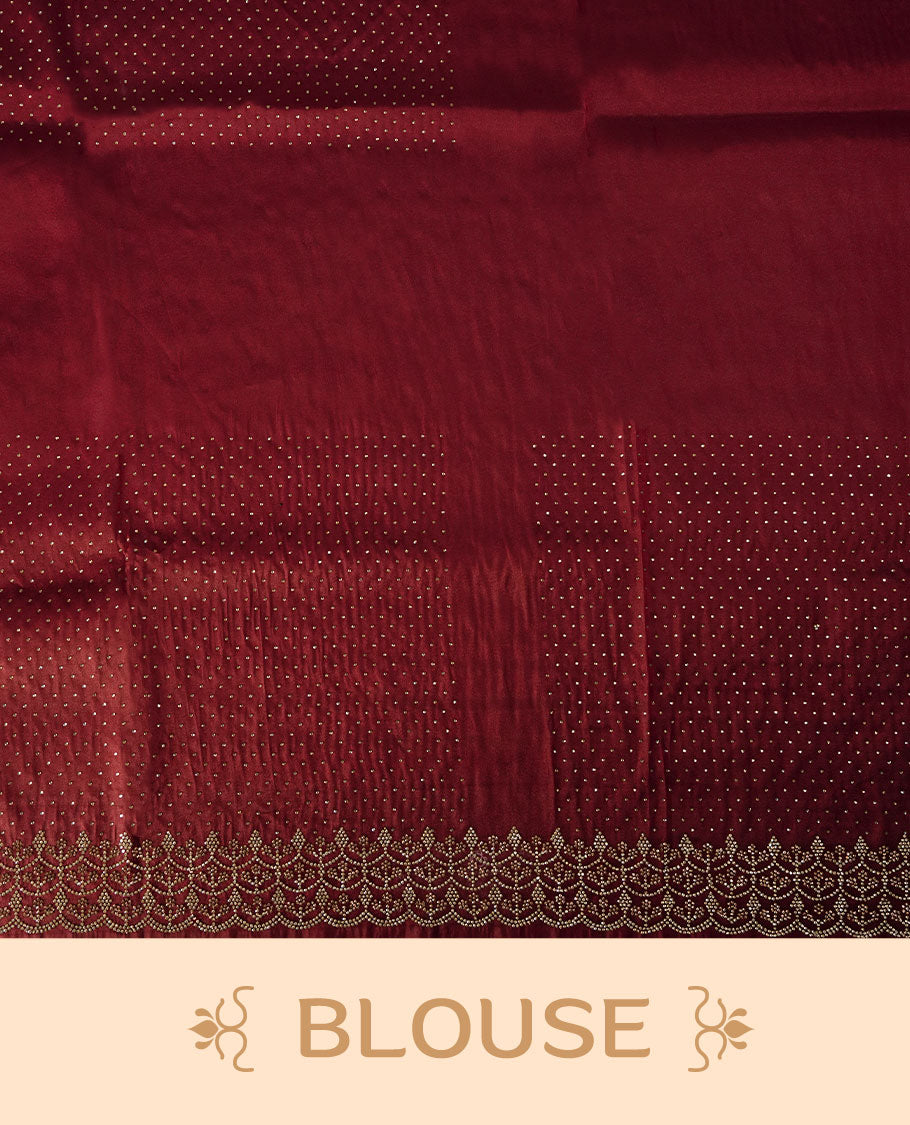 Dark Magenta Colour net shimmer fancy saree adorned with scattered white stone buttas all over the body, paired with a delicate stone worked border and matching blouse featuring floral vine stone embroidery