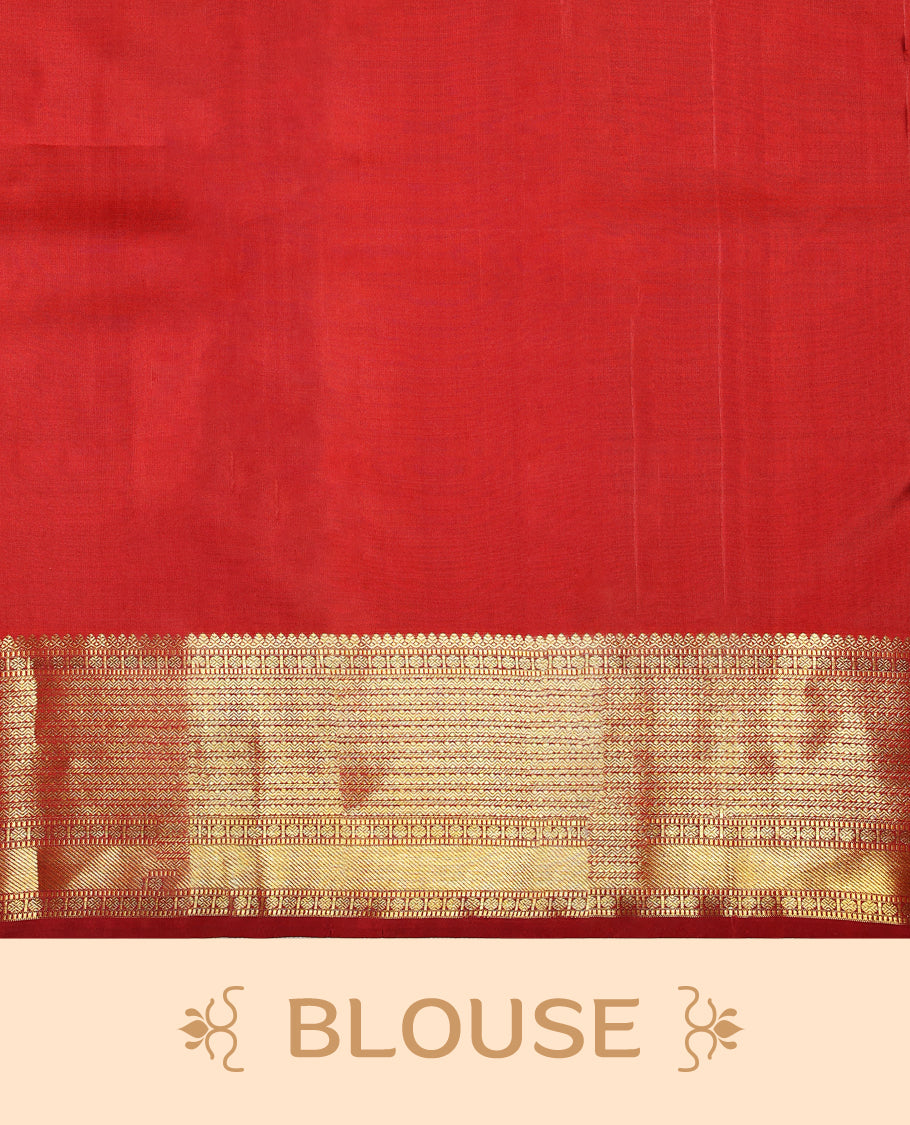 Deep red colour pure Kancheepuram traditional saree featuring gold zari Mayoora Chakra motifs across the body, enhanced with a classic traditional border and a grand pallu woven with Kuttumayil and Sayagata designs, paired with a matching blouse.