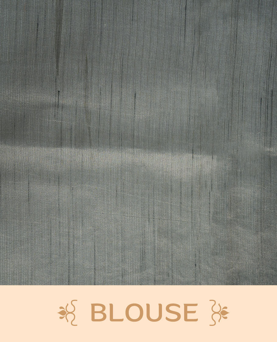 pastel green semi tusser silk saree featuring hand painted floral motifs across the pallu and lower body, highlighted with a subtle zari border and paired with a matching blouse.