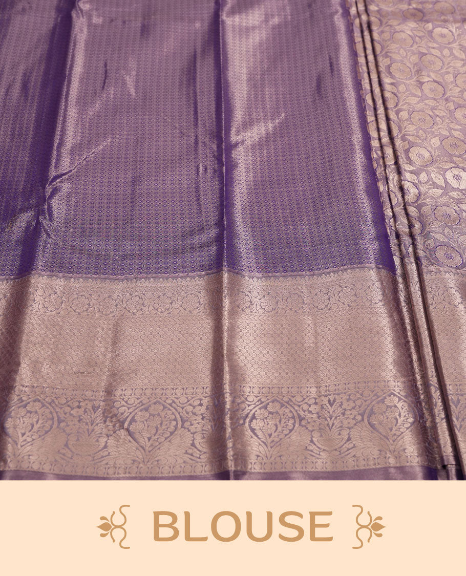 Purple colour and Antique silver Zari Tissue Brocade Saree features intricate Motifs on body and traditional border & pallu with floral patterns, paired with matching blouse