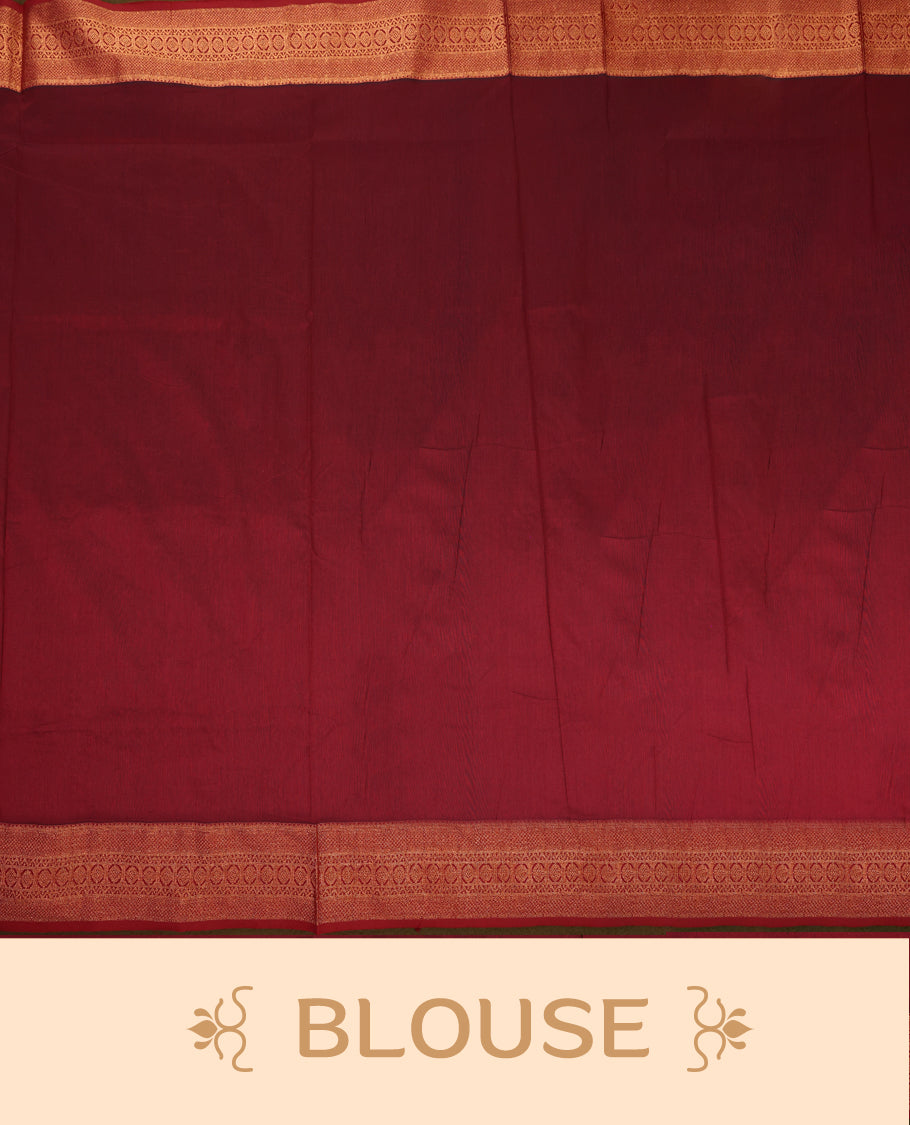 Bottle Green and Maroon Kalyani cotton saree featuring elegant dancing figure motifs on the body, complemented with a richly woven zari border and pallu in maroon, paired with a matching blouse.