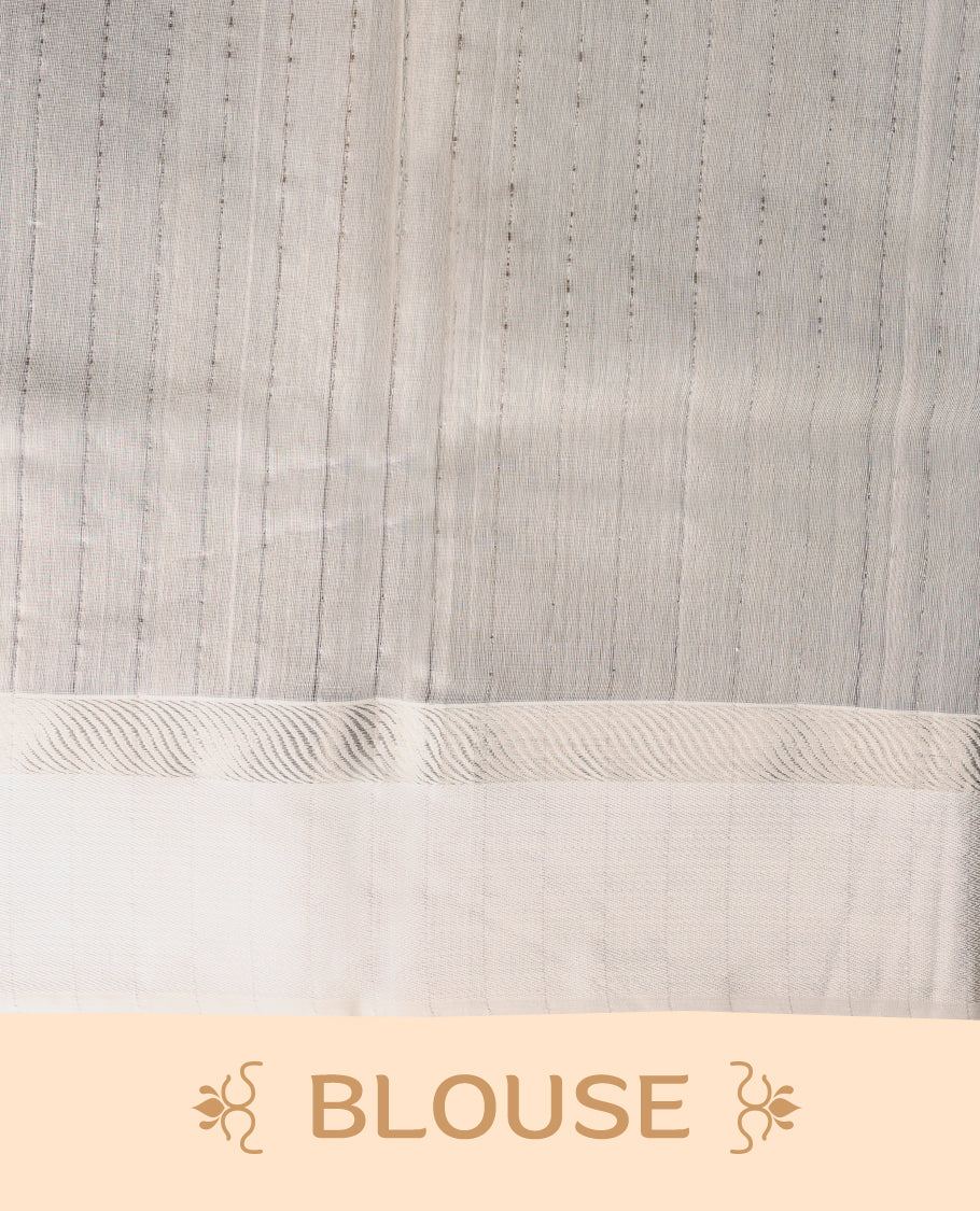 Peacock Blue coloured Maheshwari Cotton saree featuring Silver Zari motifs across the entire body, complemented by a traditional White coloured border and a matching blouse.