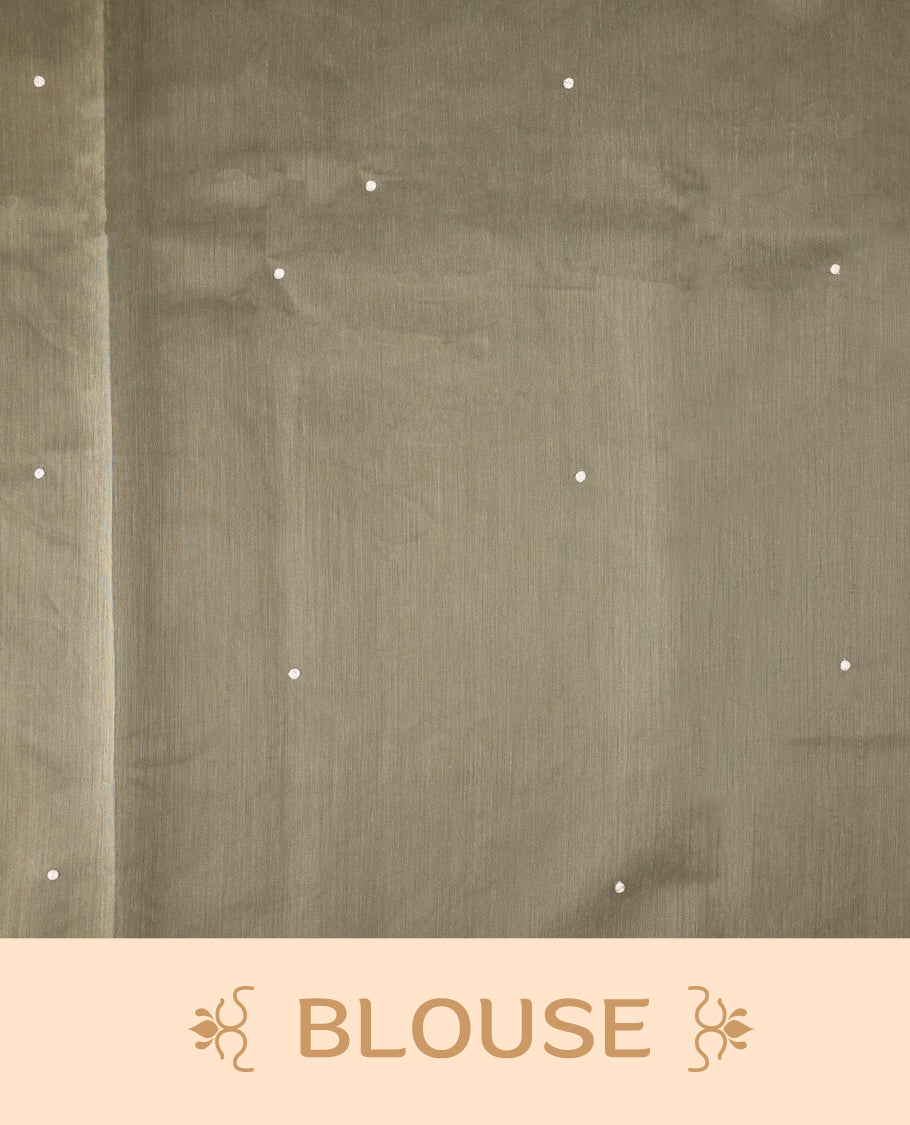 Cream colour Tussar cotton Kota saree featuring elegant Olive green leafy branch motifs across the body, accentuated with a subtle Olive green border, and paired with a matching blouse for a graceful and minimal look.
