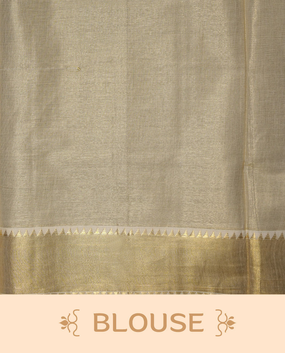Elegant light gold tissue Kerala saree featuring delicate tree-inspired gold zari buttas across the body. Finished with a broad traditional kasavu border and a richly woven pallu, paired with a matching blouse