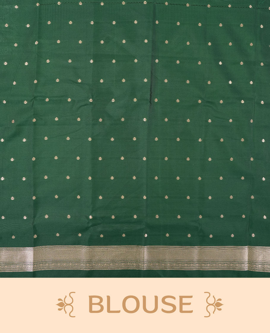 Dark green semi silk saree featuring elegant circular motifs on the body, complemented by a striking pallu adorned with intricate wavy silver thread patterns, and paired with a matching blouse