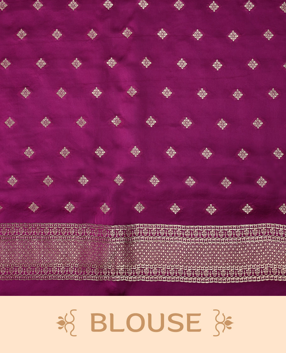 Grape colour pure Banaras crepe saree showcases elegant Gold zari Flower Motifs all over the body, a traditional gold & Silver zari border, a rich intricately woven pallu, and comes with a matching blouse.